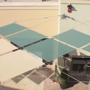 Tensile structure with wire mesh